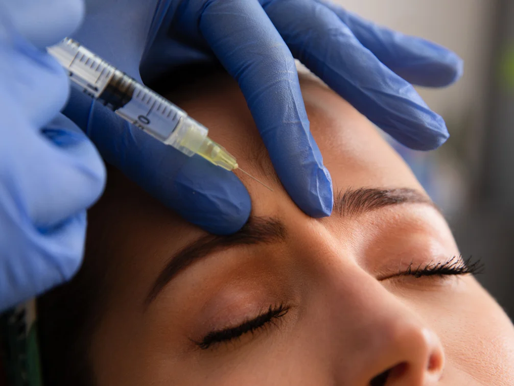 Patient at Revive getting BOTOX injections to their forehead