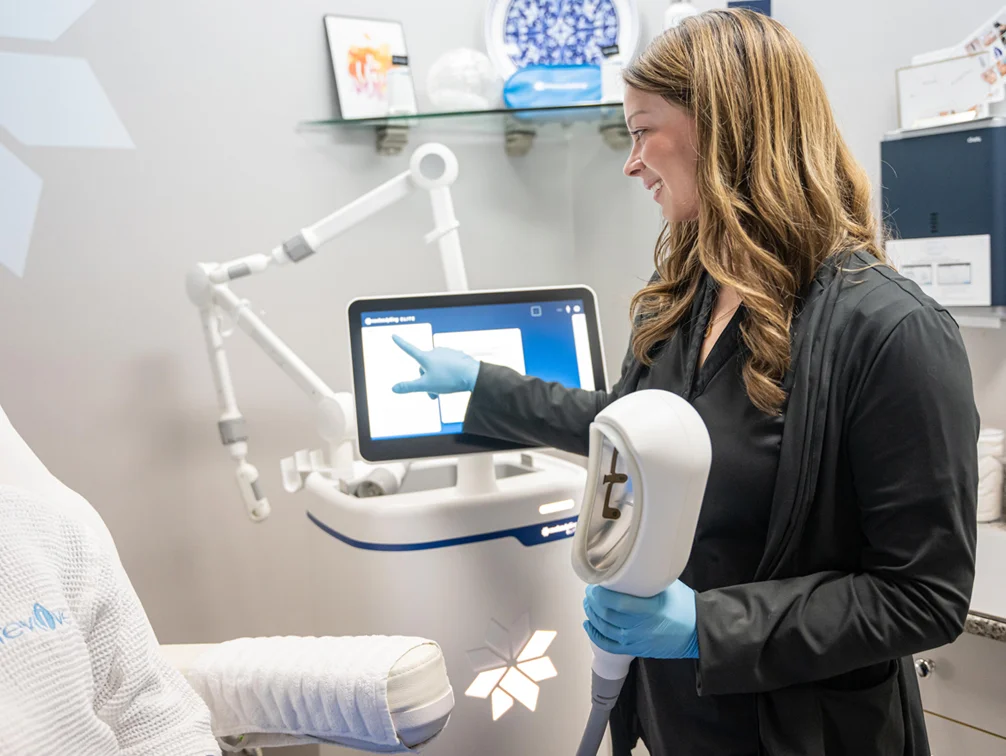 Patient getting consulted before a Coolsculpting procedure at Revive Med Spa